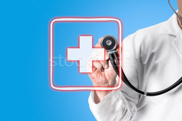 Doctor holding stethoscope in hand Stock photo © fotoquique