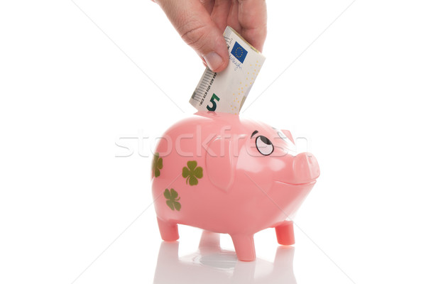 Pink money pigg with Euro Stock photo © fotoquique