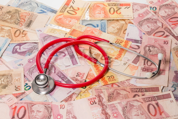 Real (Reais) bills with stethoscope Stock photo © fotoquique