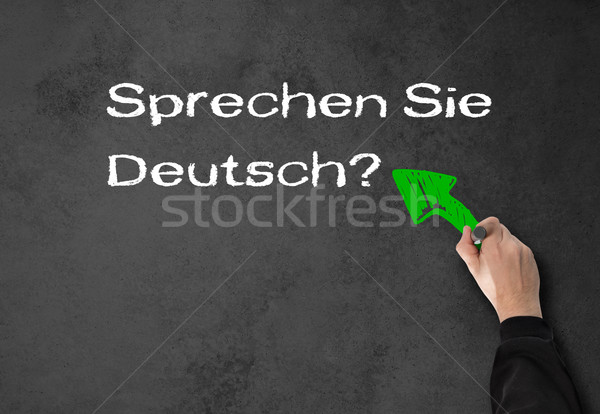 Férfi beszéd fal üzletember szürke iroda Stock fotó © fotoquique