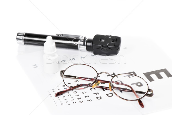 Ophthalmoscope, eye test and glasses Stock photo © fotoquique