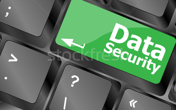 data security word with icon on keyboard button Stock photo © fotoscool