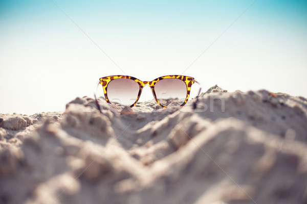 Glasses on a beach Stock photo © FotoVika