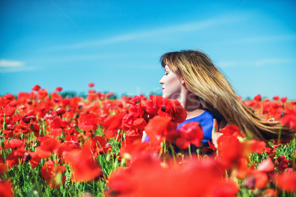 Menina beautiful girl vermelho campo flor Foto stock © FotoVika