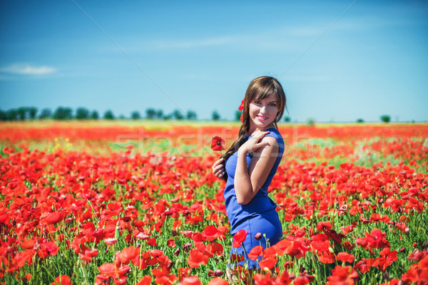 Nina amapolas hermosa niña rojo campo flor Foto stock © FotoVika