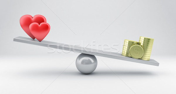 Scales with hearts and money Stock photo © FotoVika