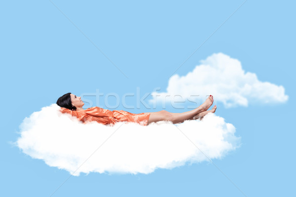 Stock photo: Girl on a cloud
