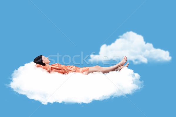 Stock photo: Girl on a cloud