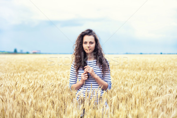 Girl in wheat Stock photo © FotoVika