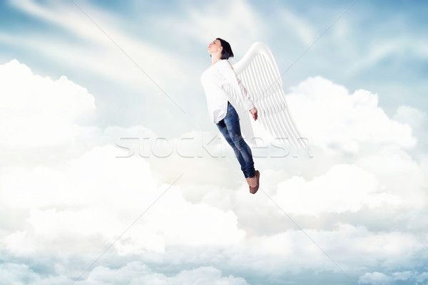 Stock photo: Girl in a clouds