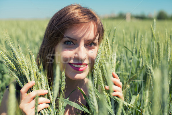 Girl in wheat Stock photo © FotoVika