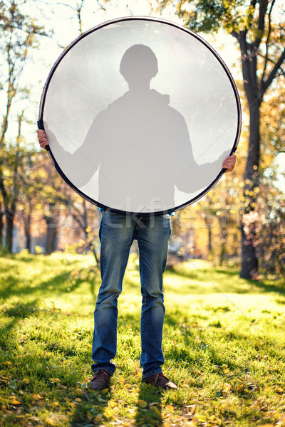 Boy with reflector Stock photo © FotoVika