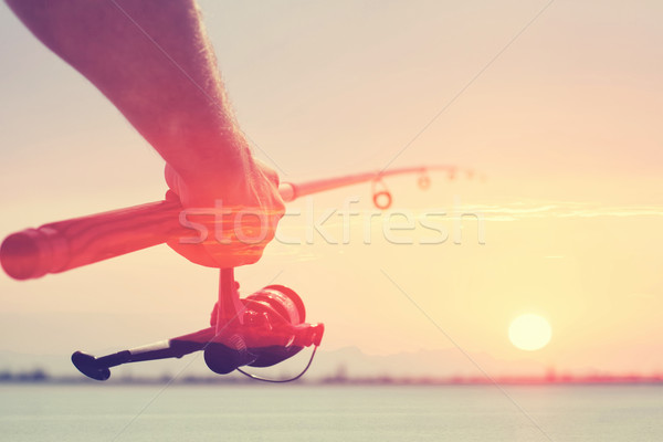 釣魚 手 美麗 天空 水 太陽 商業照片 © FotoVika