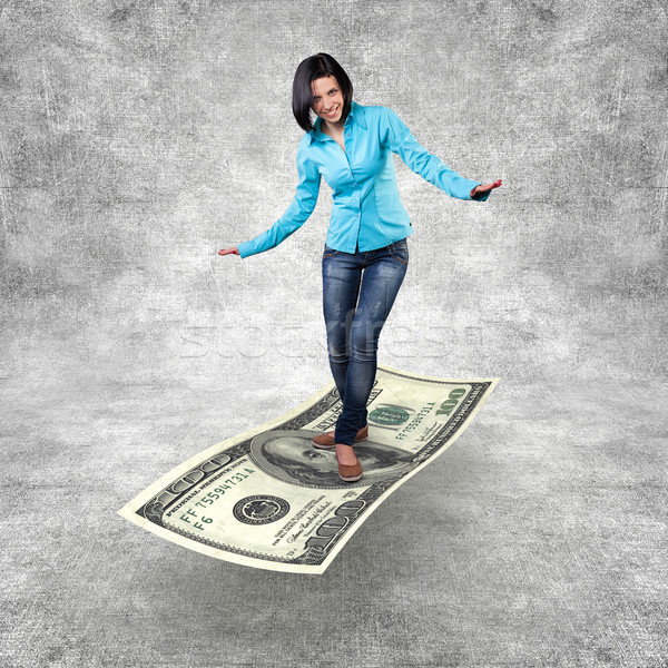 Stock photo: Girl on a money