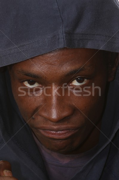 Сток-фото: сердиться · молодые · черным · человеком · лице · улице · синий