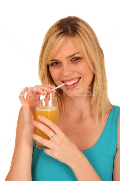 Pretty Girl Drinking Orange Juice Stock photo © fouroaks
