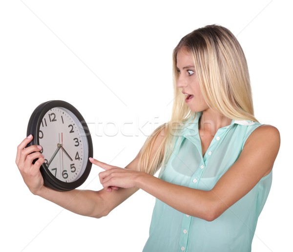 Pretty Lady Pointing to Clock Stock photo © fouroaks