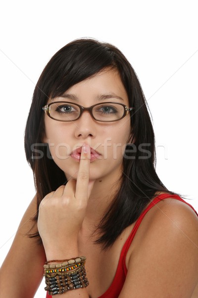 Beautiful Woman with Finger to Lips Stock photo © fouroaks