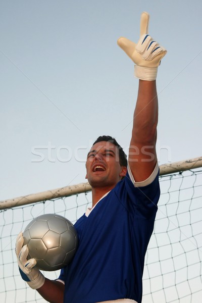 Football gardien de but gardien de but pointant équipe [[stock_photo]] © fouroaks