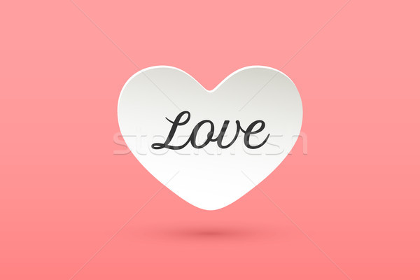 Stock photo: White paper heart with lettering Love