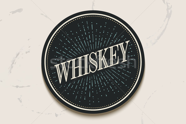 Stock photo: Beverage coaster with inscription Whiskey and light rays