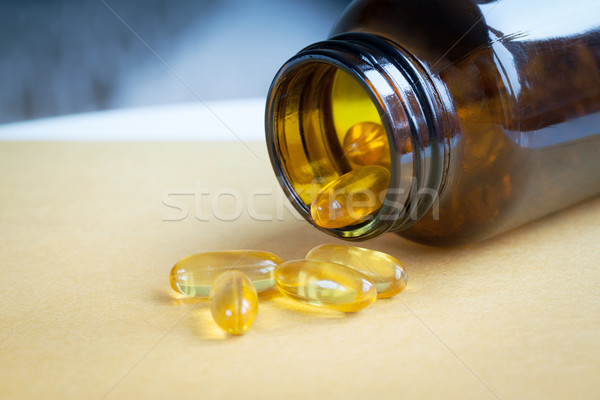 Citromsárga tabletták üveg közelkép boldog orvosi Stock fotó © FrameAngel
