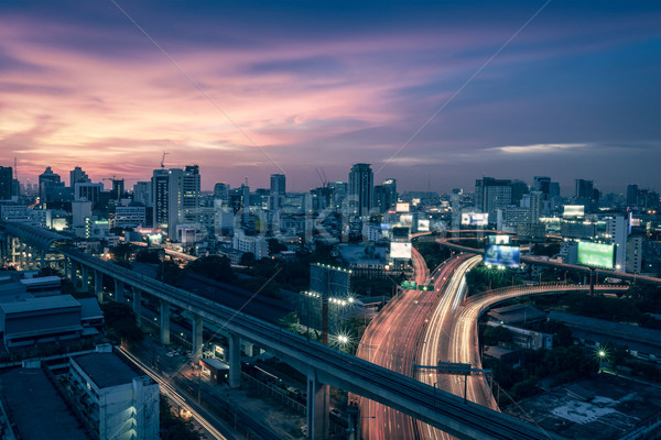 Negócio edifício Bangkok cidade vida noturna transporte Foto stock © FrameAngel