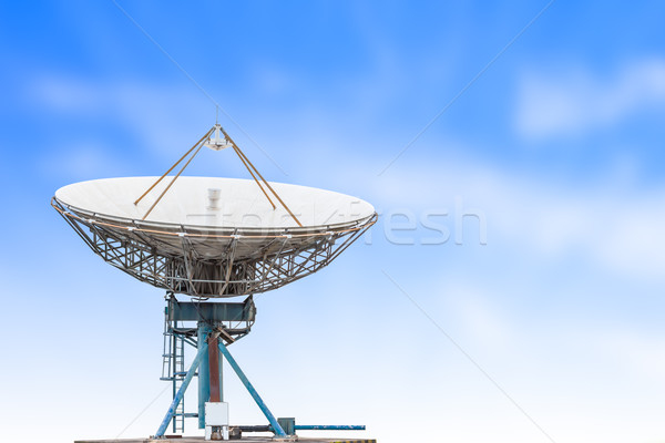satellite dish antenna radar big size and blue sky grass backgro Stock photo © FrameAngel