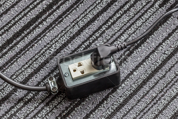 Electrical socket with power plug cable on carpet floor for safe Stock photo © FrameAngel