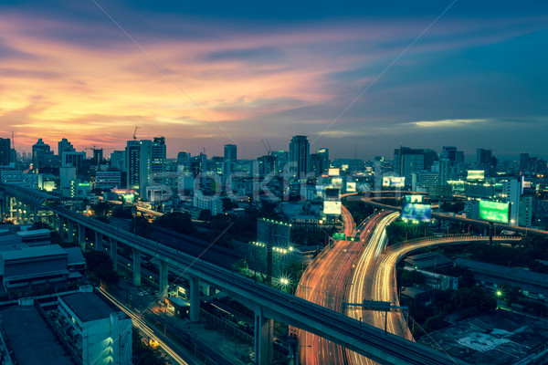 Business Building Bangkok city area at night life with transport Stock photo © FrameAngel