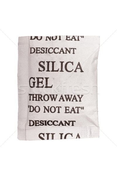 Close up silica gel or desiccant in paper bag on white backgroun Stock photo © FrameAngel