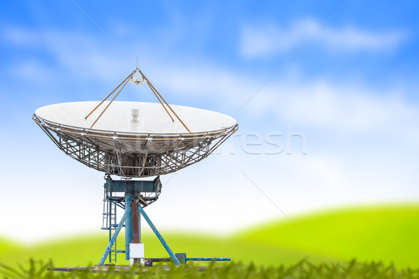 satellite dish antenna radar big size and blue sky grass backgro Stock photo © FrameAngel