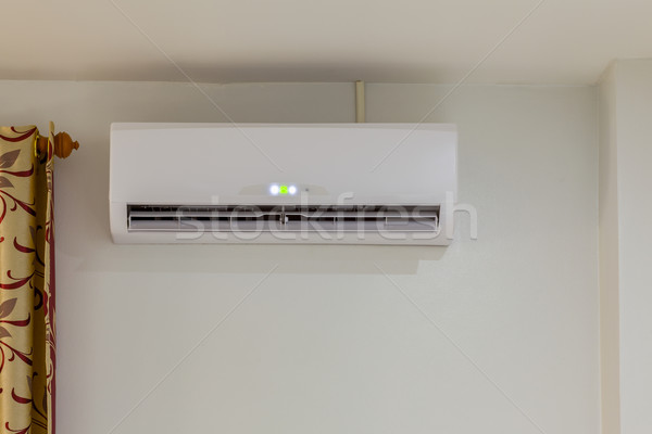 Stock photo: air conditioner install on wall for condo or meeting room, power