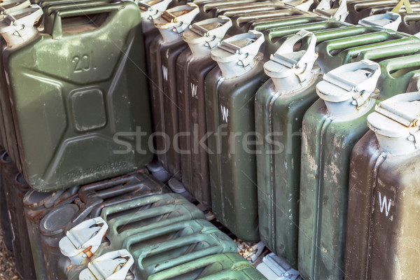 metal fuel tank or jerry can for transporting and storing gasoli Stock photo © FrameAngel