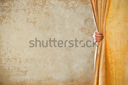 Stock photo:  Opening the curtain