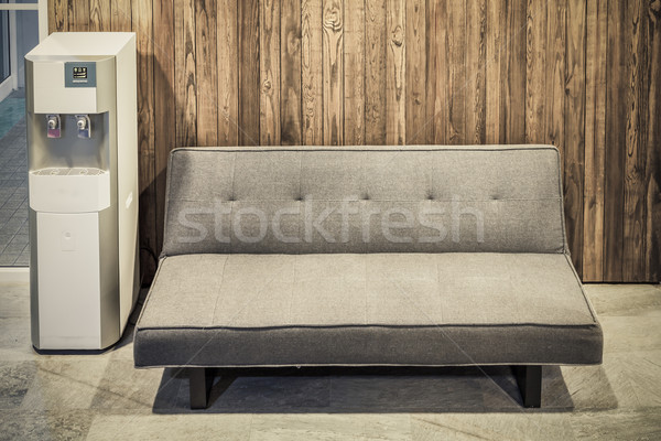sofa furniture and water cooler on wood texture background Stock photo © FrameAngel