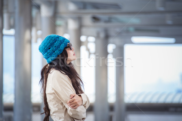 woman hugging herself and looking away with winter lonely emotio Stock photo © FrameAngel