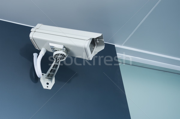 cctv camera security on wall background for safety concept Stock photo © FrameAngel