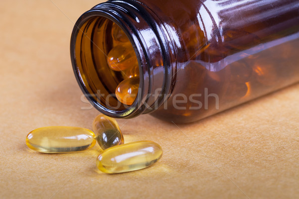 Citromsárga tabletták üveg közelkép boldog orvosi Stock fotó © FrameAngel