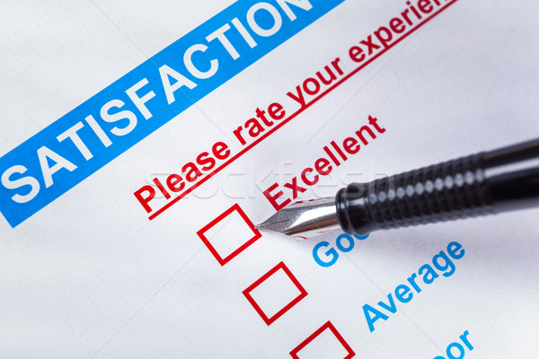 Customer satisfaction survey checkbox with rating and pen pointi Stock photo © FrameAngel