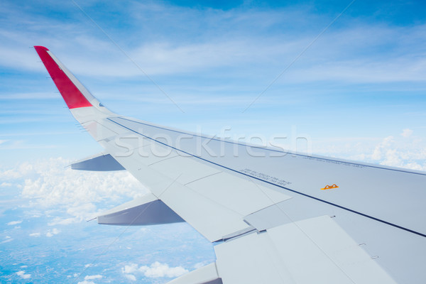 Foto stock: Asa · avião · voador · acima · nuvens · blue · sky