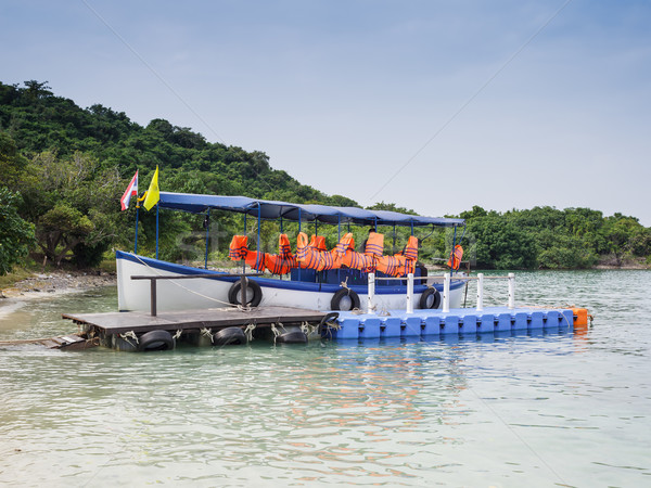 Plastikowe dok niebieski kamizelka ratunkowa plaży wody Zdjęcia stock © FrameAngel