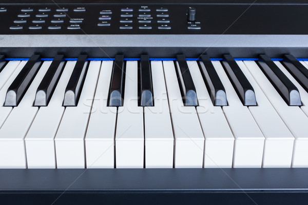Piano Keyboard synthesizer closeup key frontal view Stock photo © FrameAngel