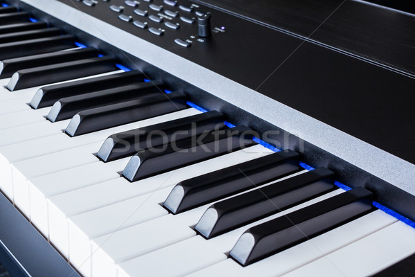 Piano Keyboard synthesizer closeup key frontal view Stock photo © FrameAngel