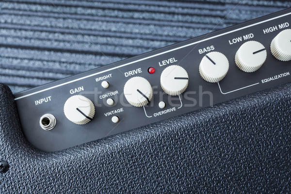 Button of Guitar Power Amplifier, closeup view background Stock photo © FrameAngel