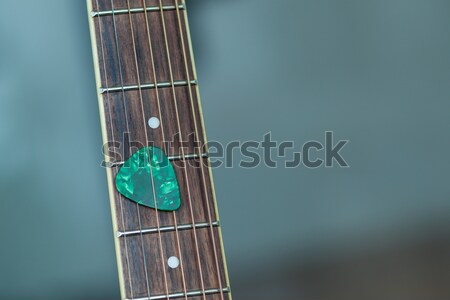 colorful guitar pick on finger board, as abstract background Stock photo © FrameAngel