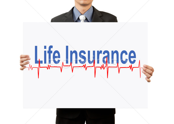 businessman holding life insurance on white background Stock photo © FrameAngel