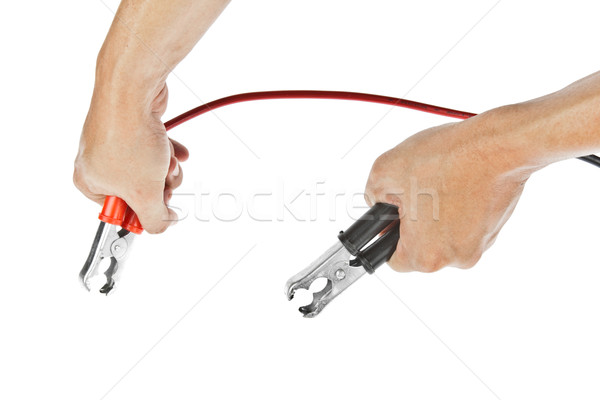 Human hand giving to charge battery Stock photo © FrameAngel