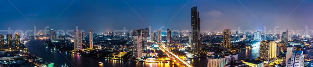 Business Building Bangkok city area at night life with transport Stock photo © FrameAngel