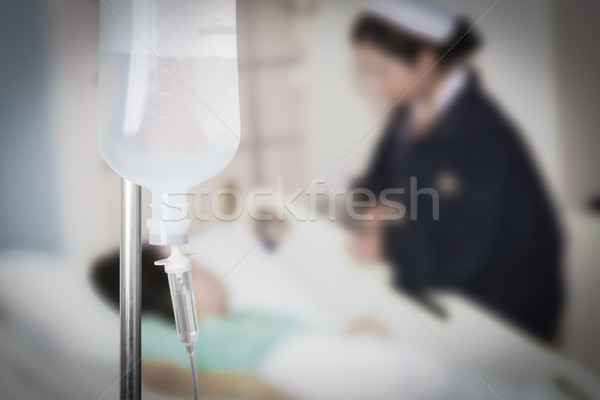 Infusion bottle with saline solution for patient in hospital roo Stock photo © FrameAngel